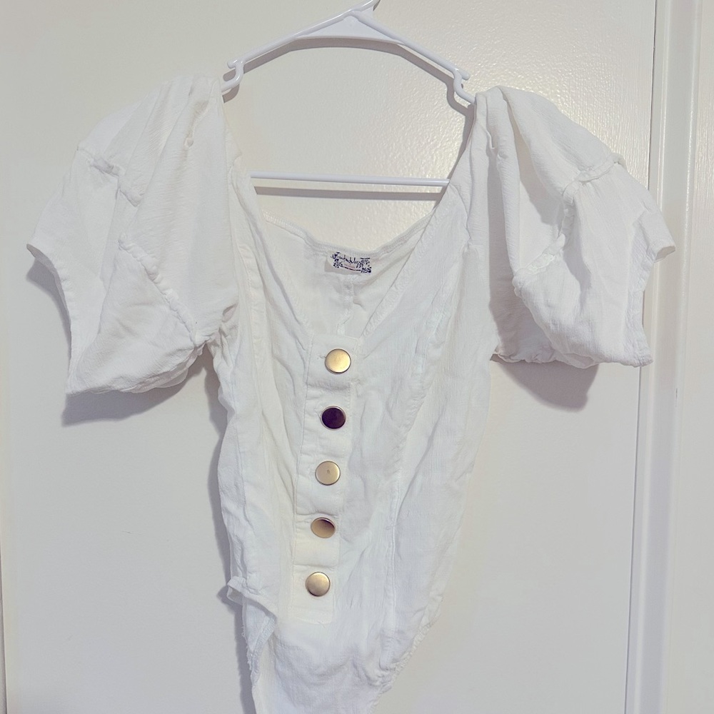 White ruffle sleeve bodysuit free people